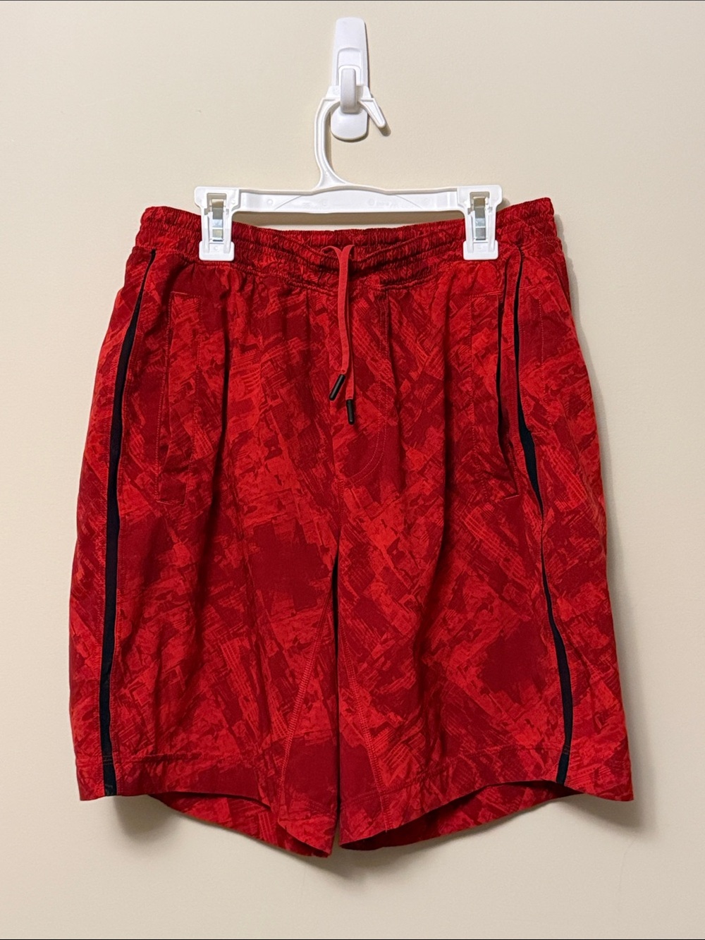 Men’s Red Lululemon 9” Lined Pacebreaker shorts - size medium